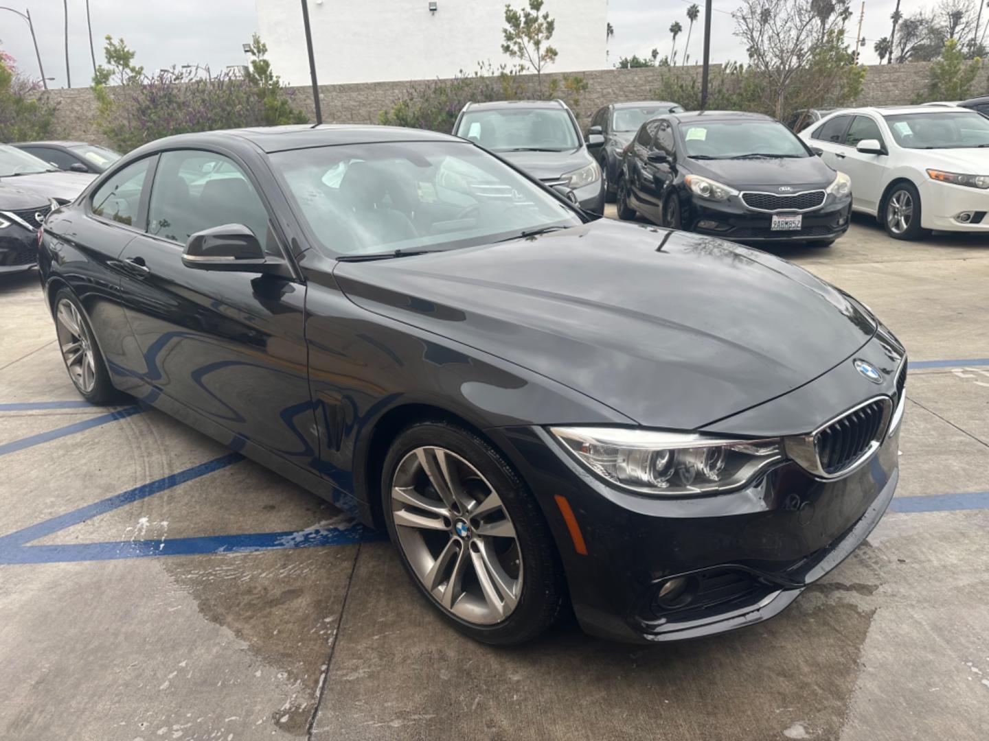 2015 Black BMW 4-Series 435i coupe (WBA3R1C55FK) with an 3.0L V6 DOHC 24V engine, 8-Speed Automatic transmission, located at 30 S. Berkeley Avenue, Pasadena, CA, 91107, (626) 248-7567, 34.145447, -118.109398 - Crown City Motors is a used “Buy Here Pay Here” car dealer in Pasadena CA. “Buy Here Pay Here” financing, means that when you purchase your vehicle from our dealership, that you make the payments to the dealership as well. We do not need the banks approval to get you approved for a used auto - Photo#6